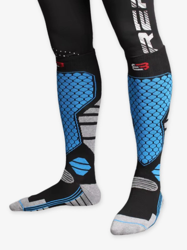 Men's thick knee-high ski socks with a honeycomb knit panel on the shin - black/blue