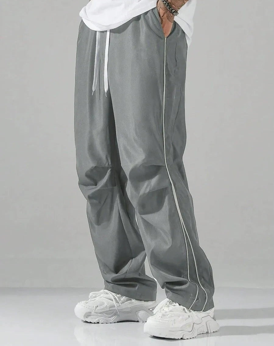 Men's relaxed tracksuit bottoms with side piping and a drawcord - grey