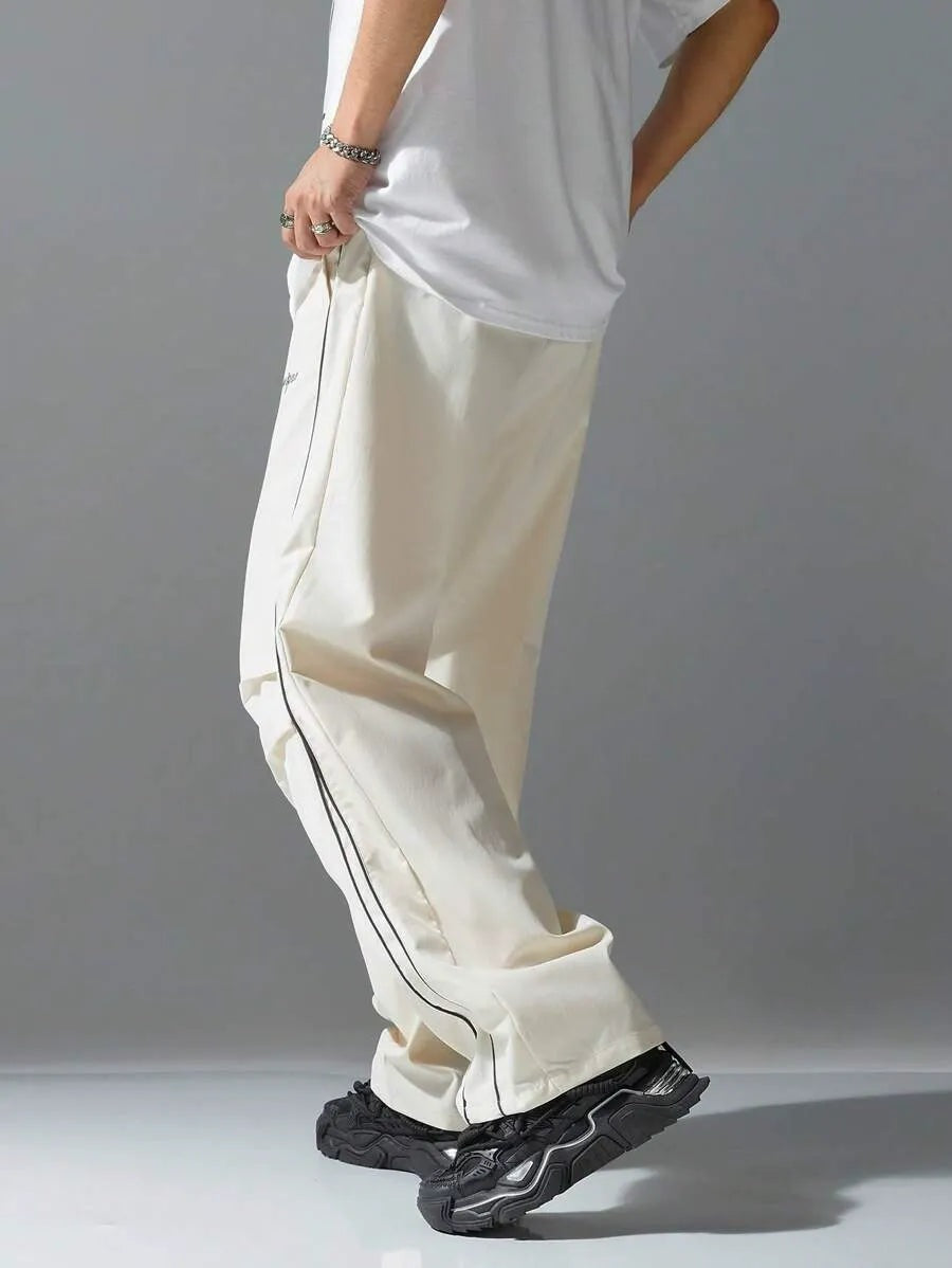 Men's relaxed tracksuit bottoms with side piping and a drawcord - view 7