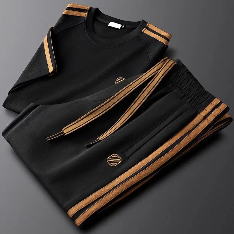 Men's two-piece set with a T-shirt and straight trousers with gold-tone side stripes - black