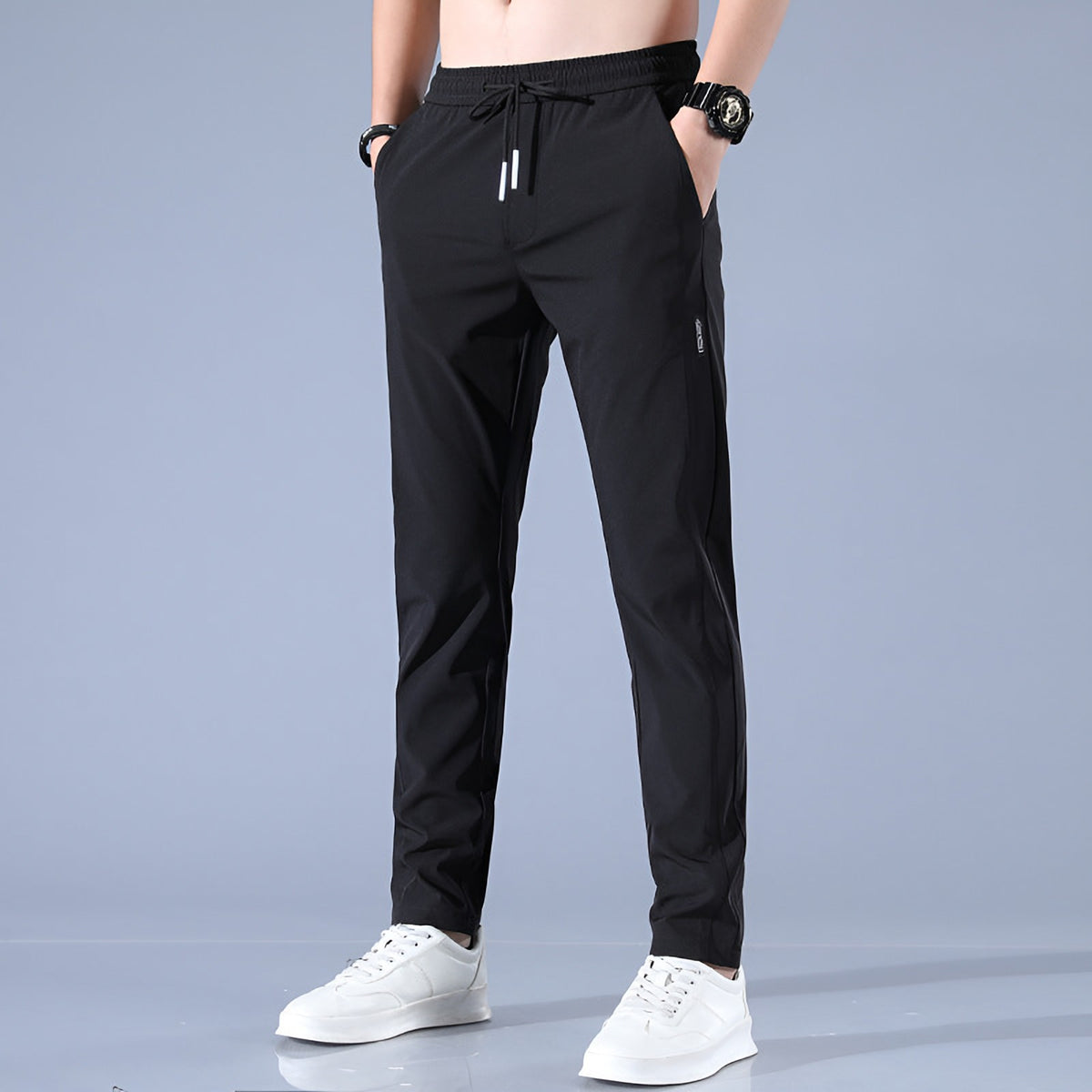 Men's waterproof stretch golf trousers in black, front view