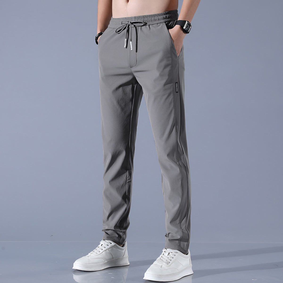 Men's waterproof stretch golf trousers in dark grey, front view