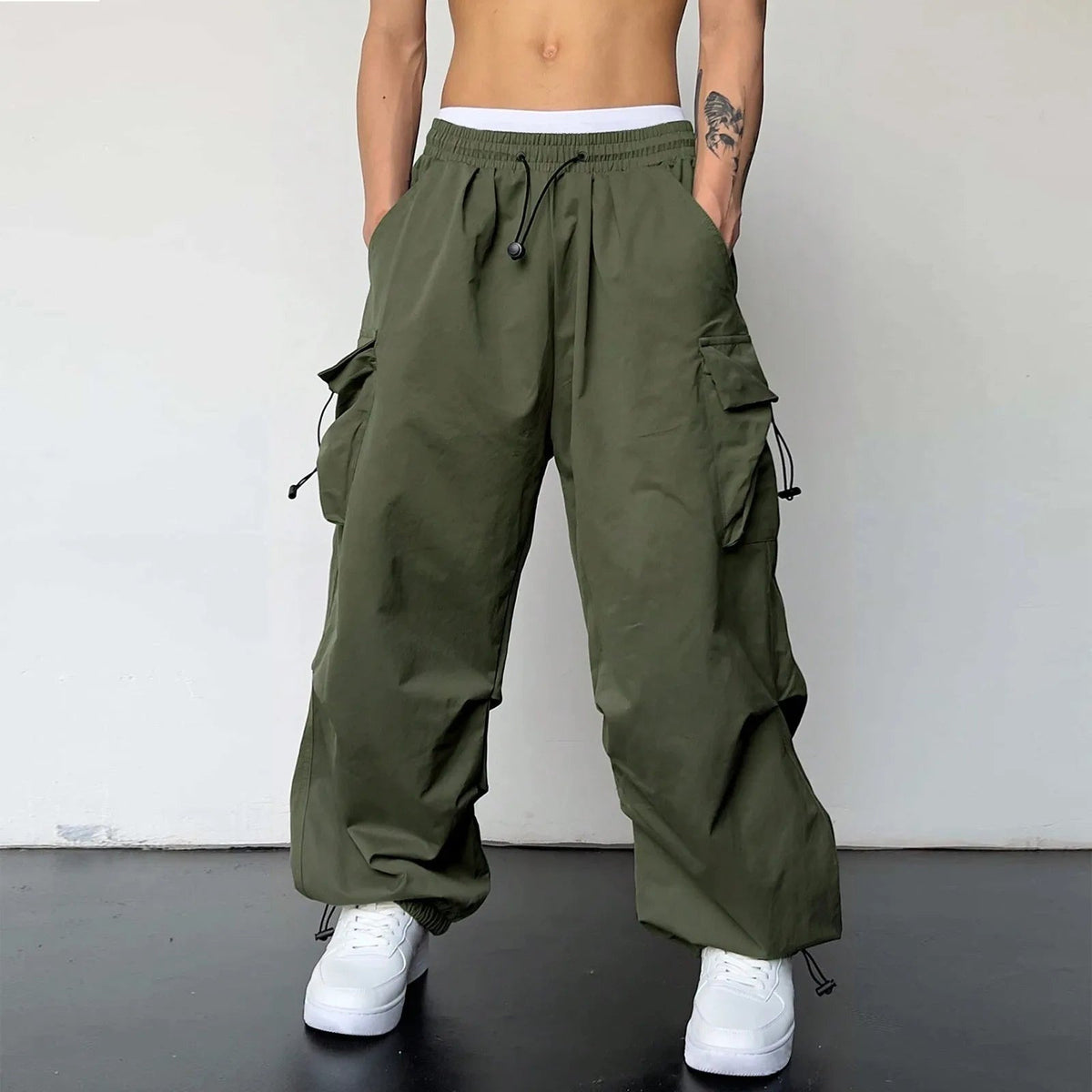 Men's wide-leg cargo trousers with a drawcord waist, flap pockets and adjustable ankles - view 8
