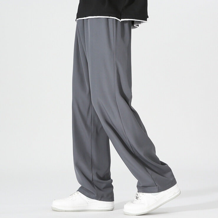Men's wide-leg trousers with an elasticated waist and a pleat down the front of the leg - view 2