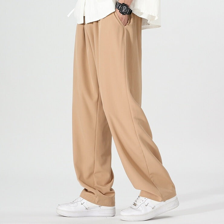 Men's wide-leg trousers with an elasticated waist and a pleat down the front of the leg - view 4