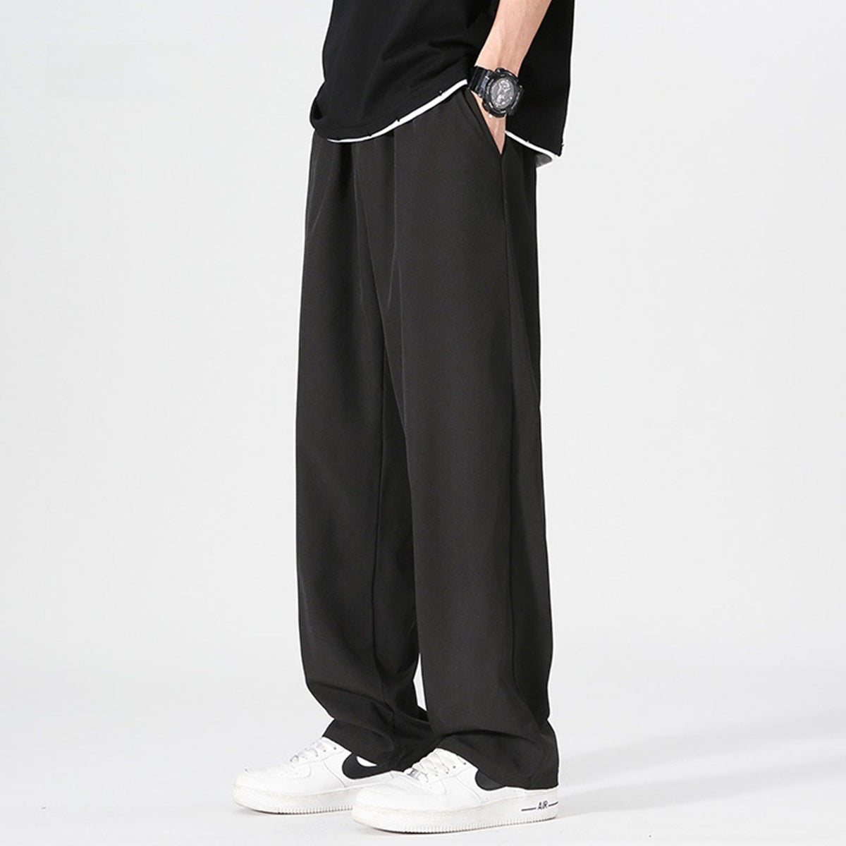 Men's wide-leg trousers with an elasticated waist and a pleat down the front of the leg - black