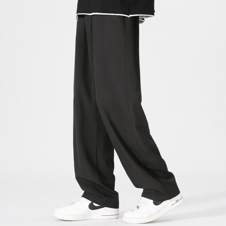 Men's wide-leg trousers with an elasticated waist and a pleat down the front of the leg - view 8