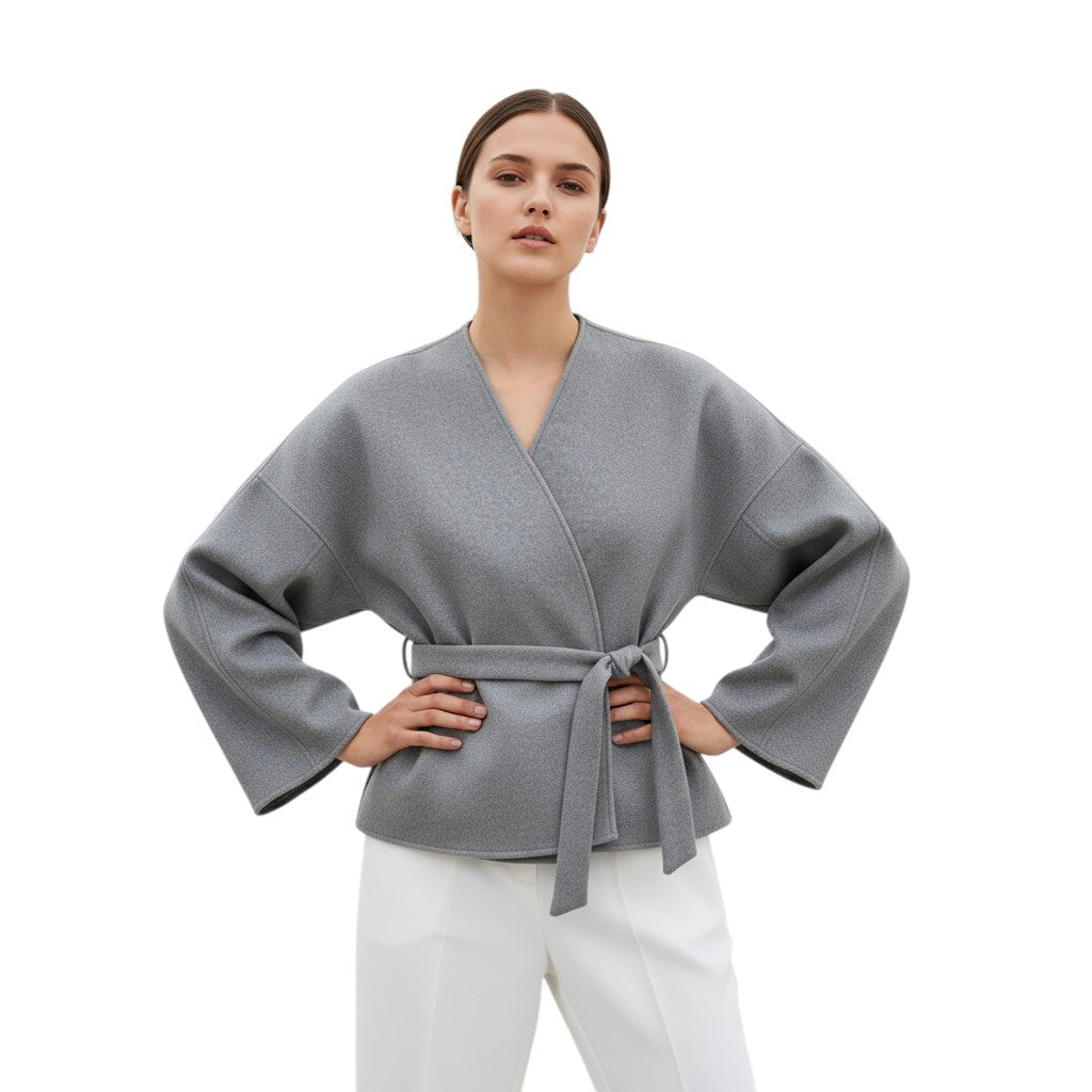 Collarless wrap jacket in a felted cloth with wide sleeves and a tie belt in grey