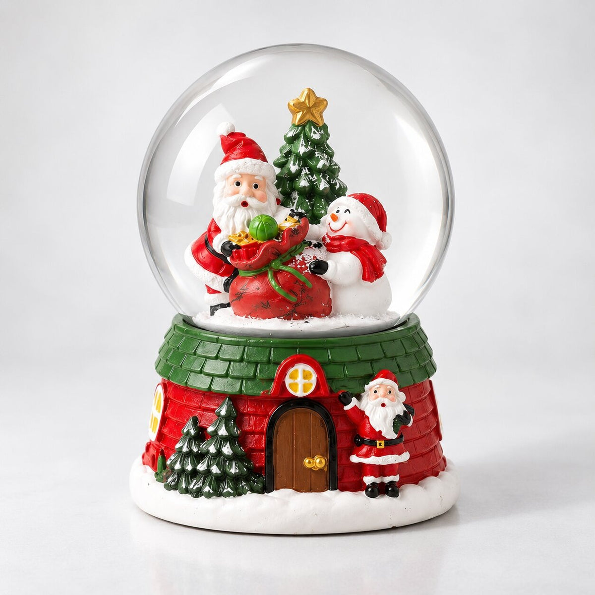 Musical glass snow globe with Santa on a Christmas house base - santa and snowman