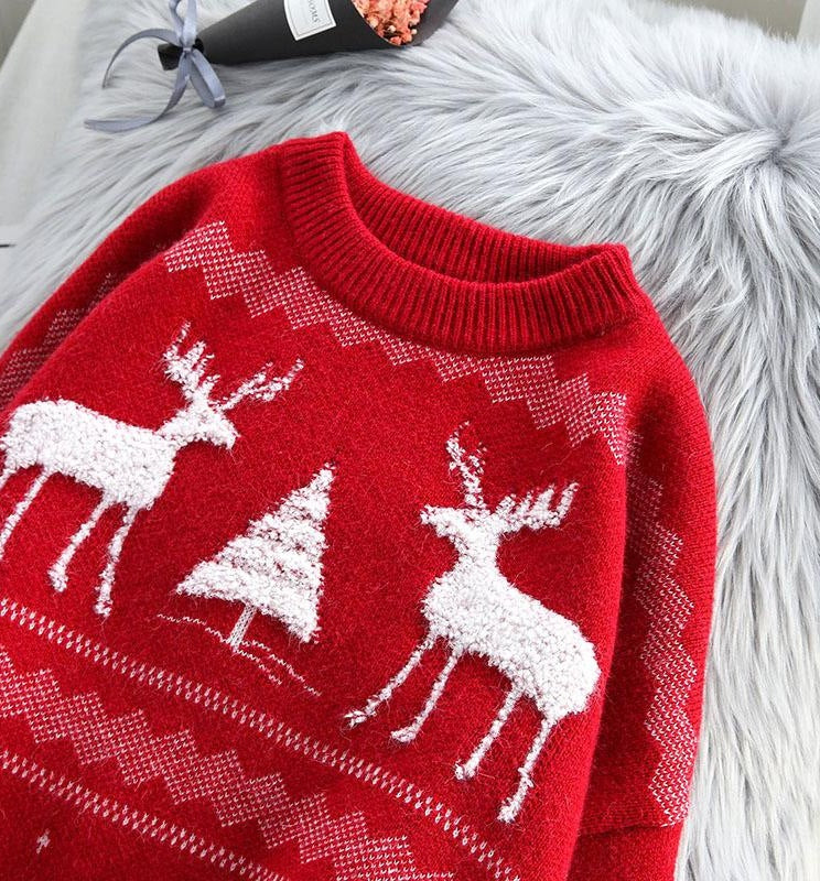 Women's oversized Christmas jumper with fluffy reindeer and a little tree
