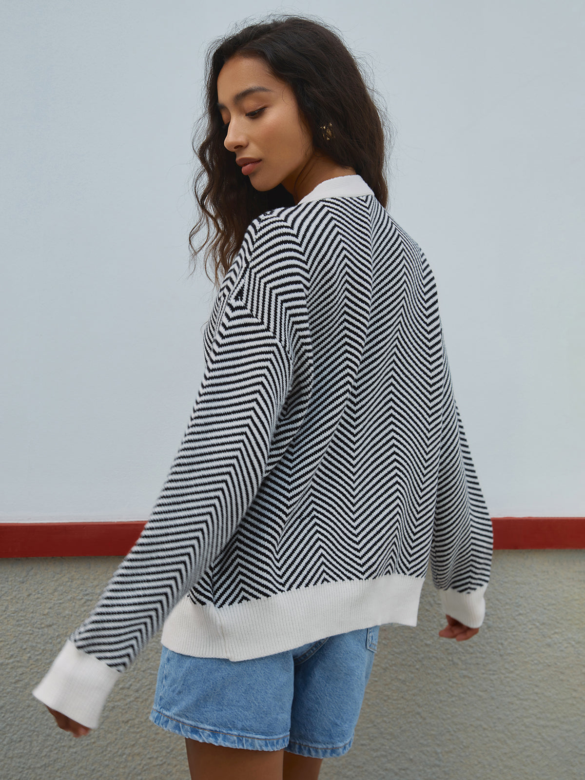 Women's oversized herringbone stripe cardigan with a V-neck and contrast trim