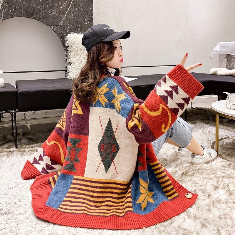 Women's oversized knitted Christmas cardigan in patchwork with stars and snowflakes