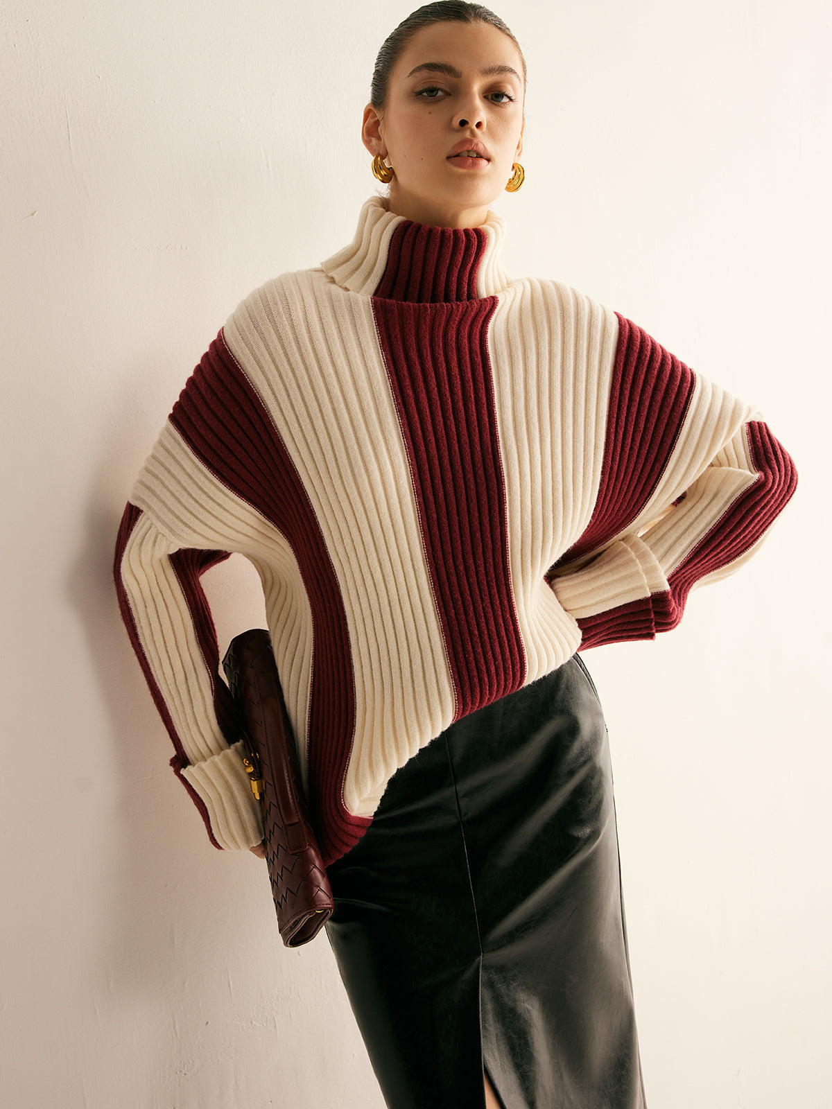 Women's oversized roll neck jumper with vertical colour blocks in chunky rib
