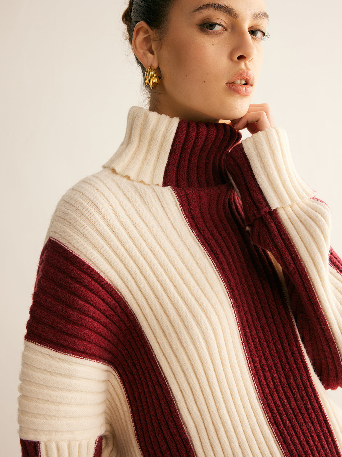 Women's oversized roll neck jumper with vertical colour blocks in chunky rib