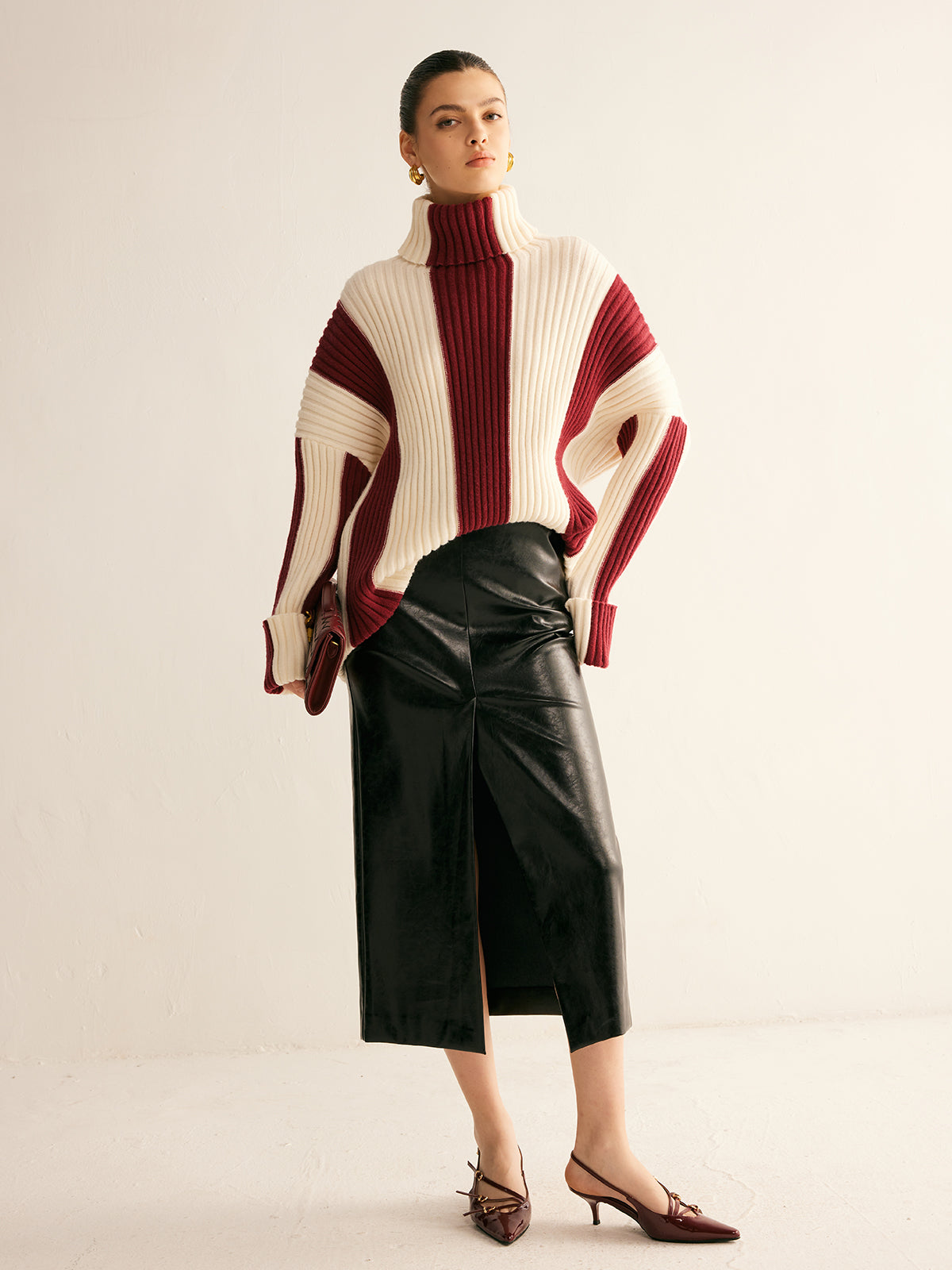 Women's oversized roll neck jumper with vertical colour blocks in chunky rib