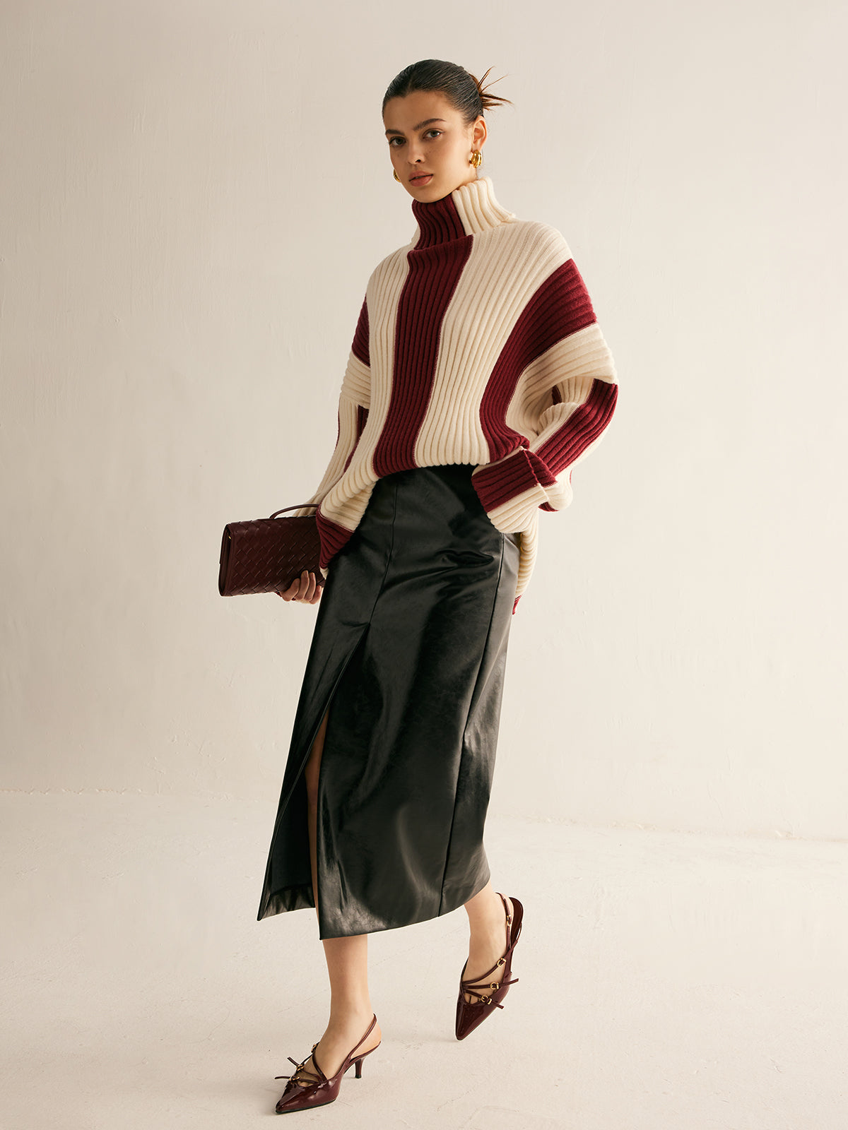 Women's oversized roll neck jumper with vertical colour blocks in chunky rib