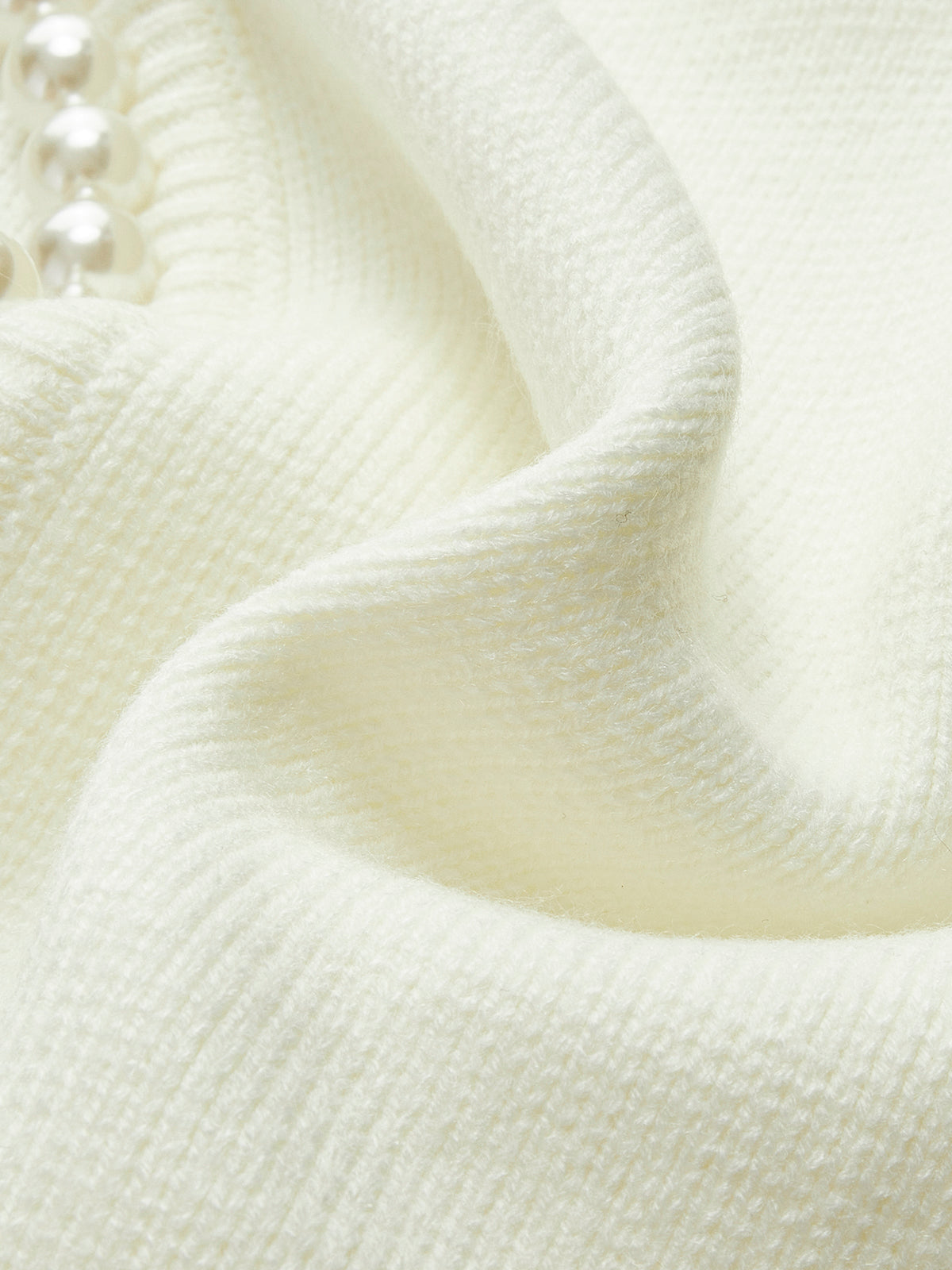 Women's short cardigan with a round neck, pearl trim and balloon sleeves