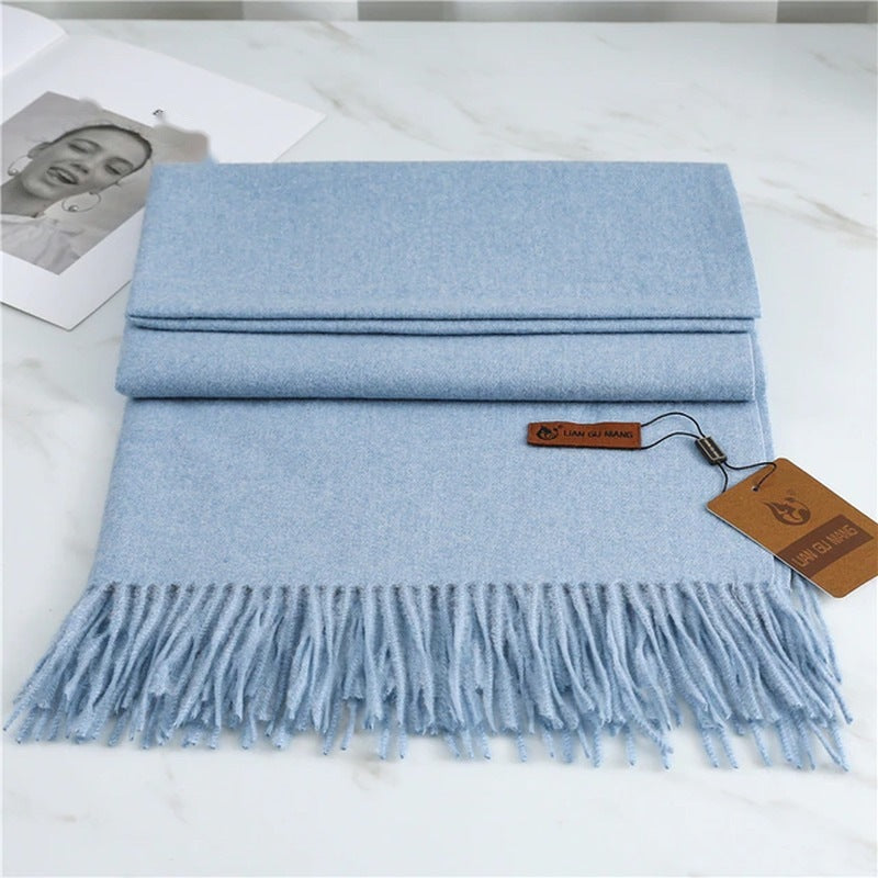 Women's plain woven scarf in a dense fabric with fringe at both ends - light blue