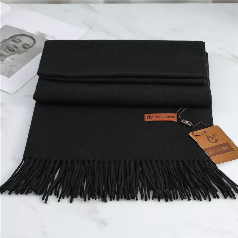 Women's plain woven scarf in a dense fabric with fringe at both ends - black
