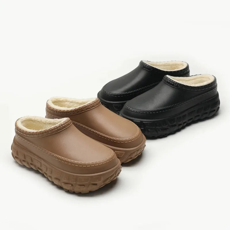 Platform slippers with a faux leather upper, thick tyre-tread sole and plush lining