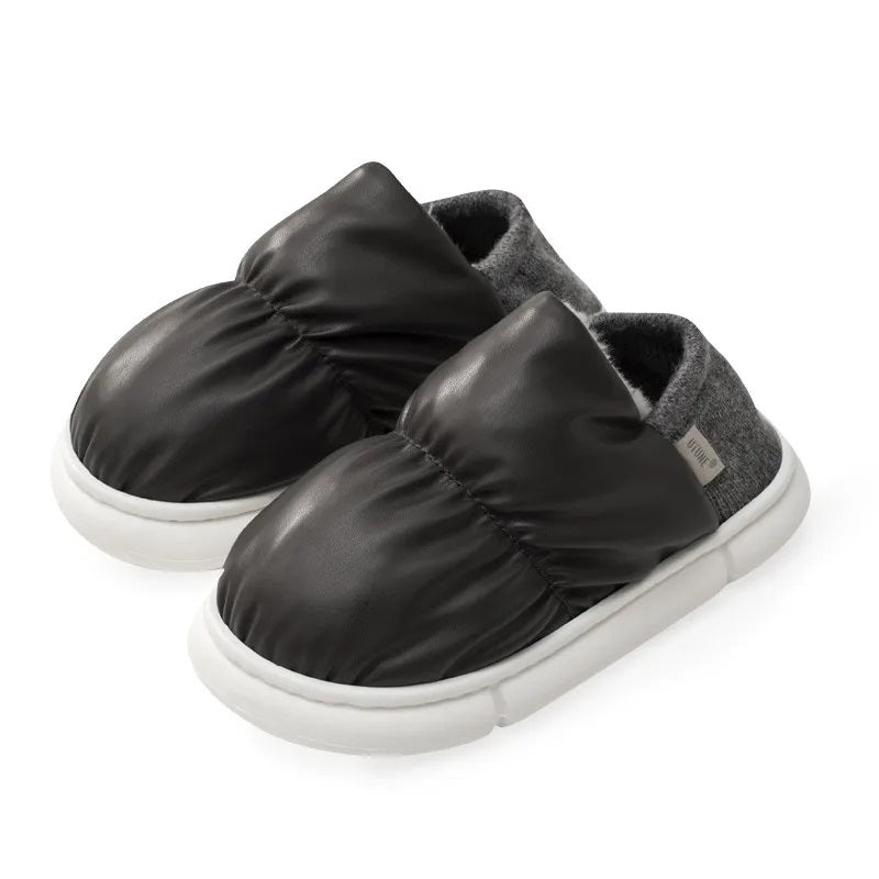 Platform slippers in faux leather with a puffer-style upper, knit heel and thick sole - black