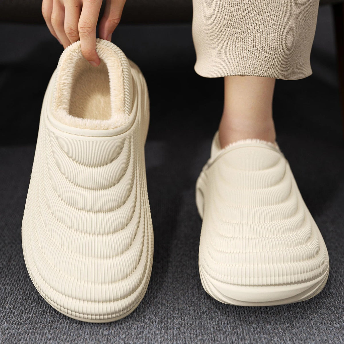 Plush-lined EVA slippers with fine wave ribbing and a thick sole