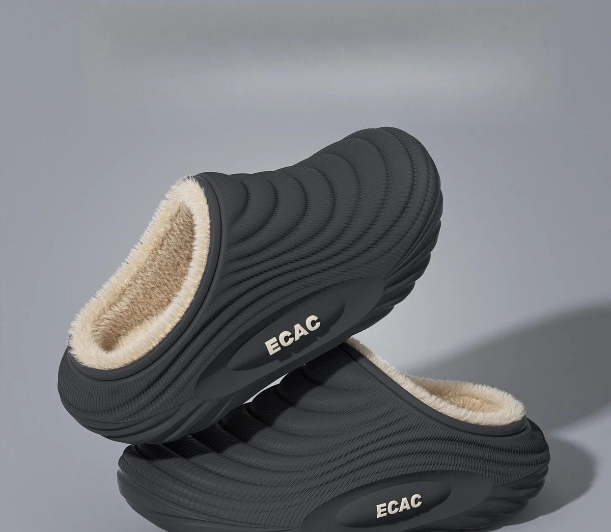 Plush-lined EVA slippers with fine wave ribbing and a thick sole - dark grey open back