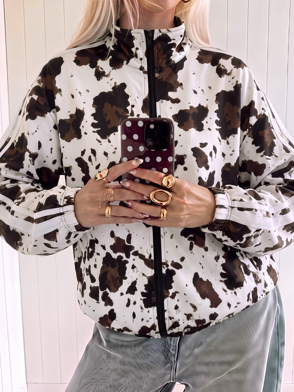 Printed track jacket for women with two sleeve stripes and stand collar - cow print