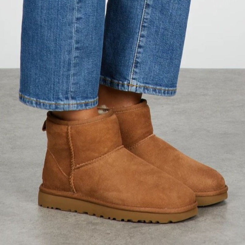 Women's faux fur-lined mini boots in a suede look