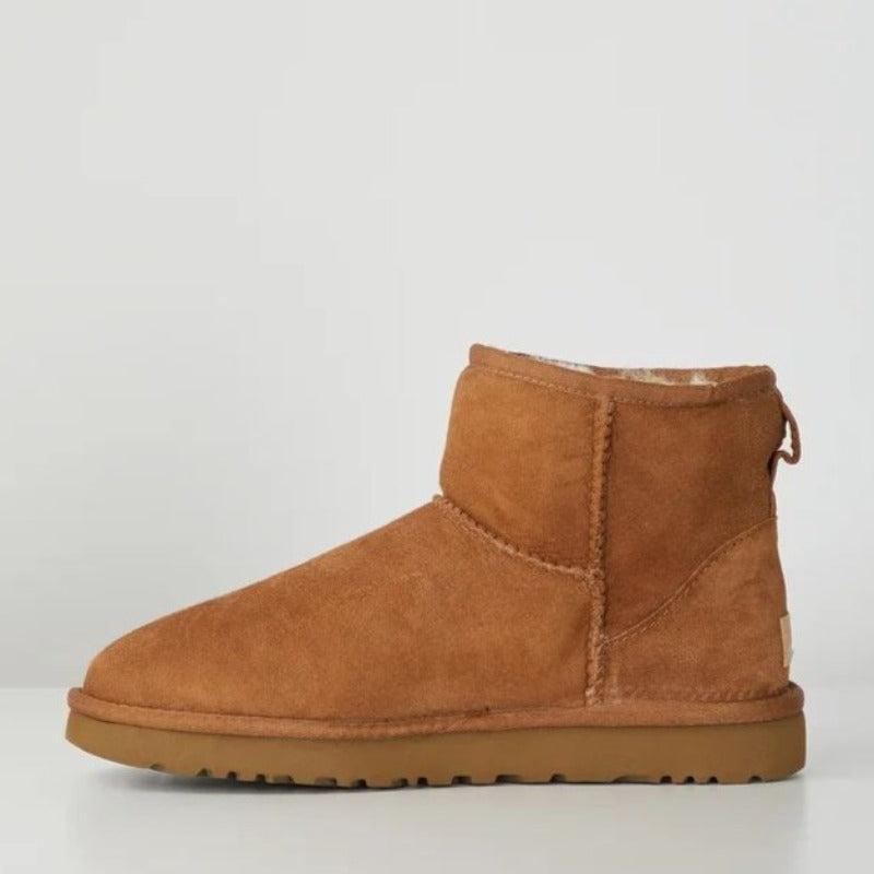 Women's faux fur-lined mini boots in a suede look