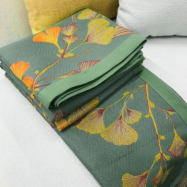 Quilted bedspread with a ginkgo leaf print on a made bed - view 5