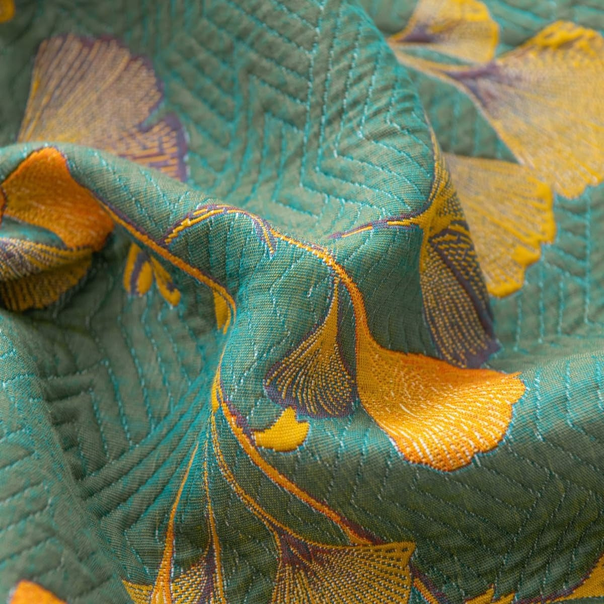 Quilted bedspread with a ginkgo leaf print on a made bed - view 6