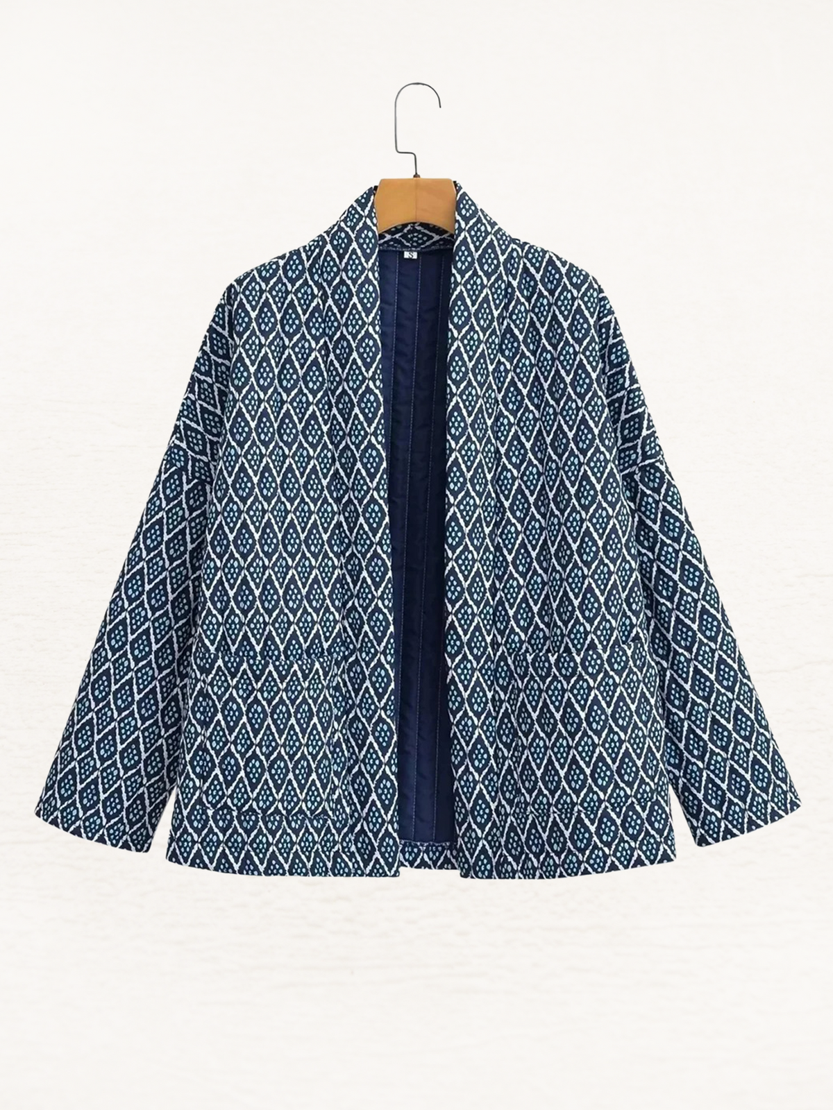Women's quilted kimono jacket with a geometric print and an open front