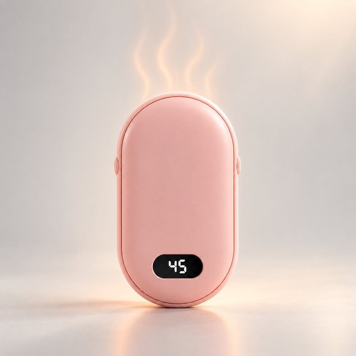Rechargeable hand warmer with a digital temperature display - pink