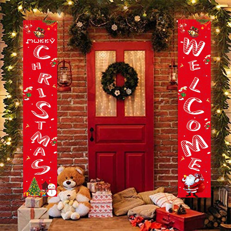 Set of two red Christmas porch banners, 180 x 30 cm, beside a front door