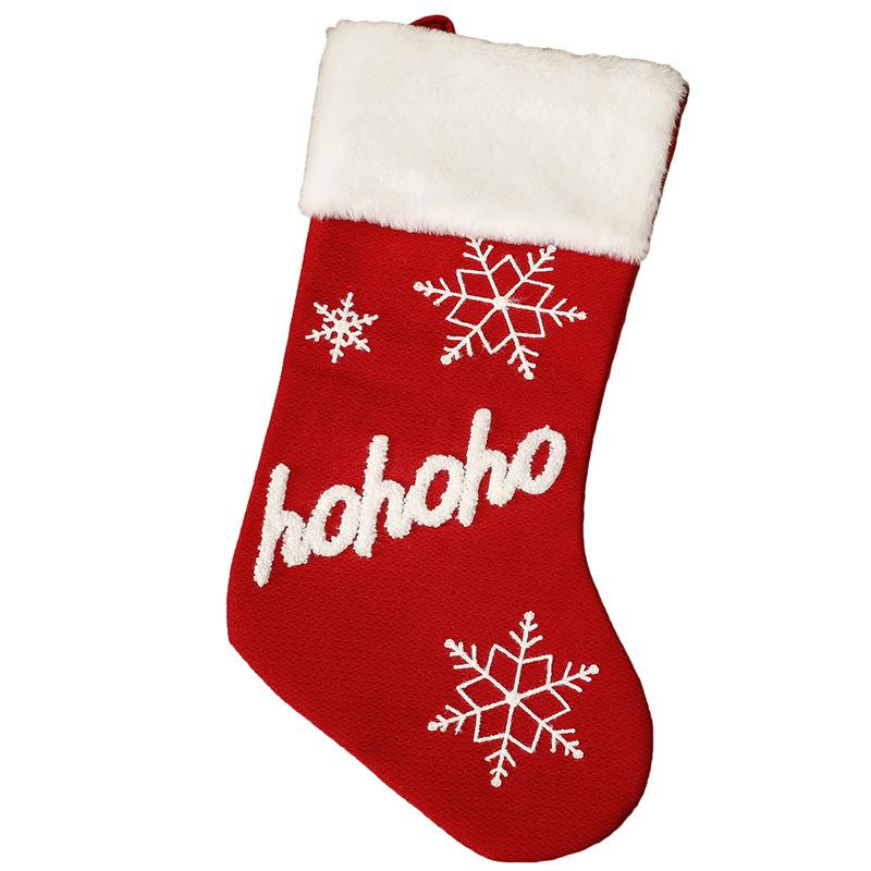 Red Christmas stocking with a white plush cuff, snowflakes and lettering - ho ho ho