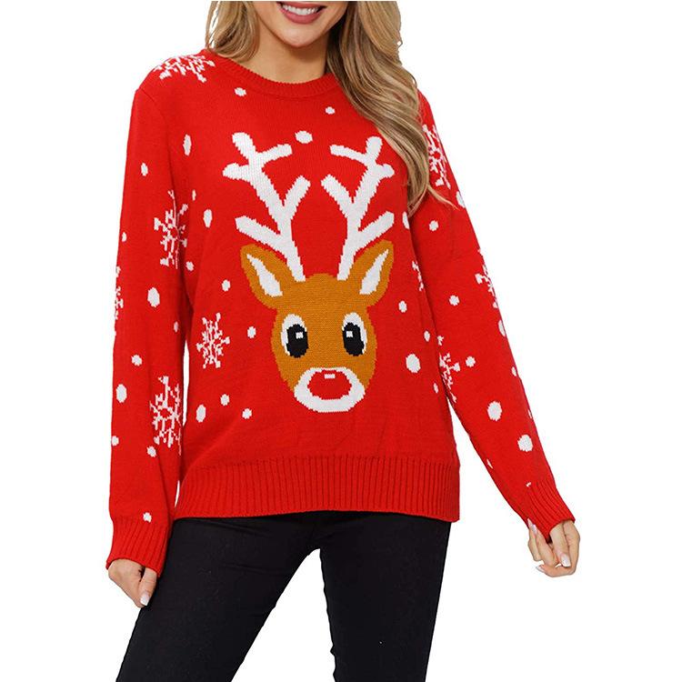 Women's red knitted Christmas jumper with a reindeer face and snowflake sleeves