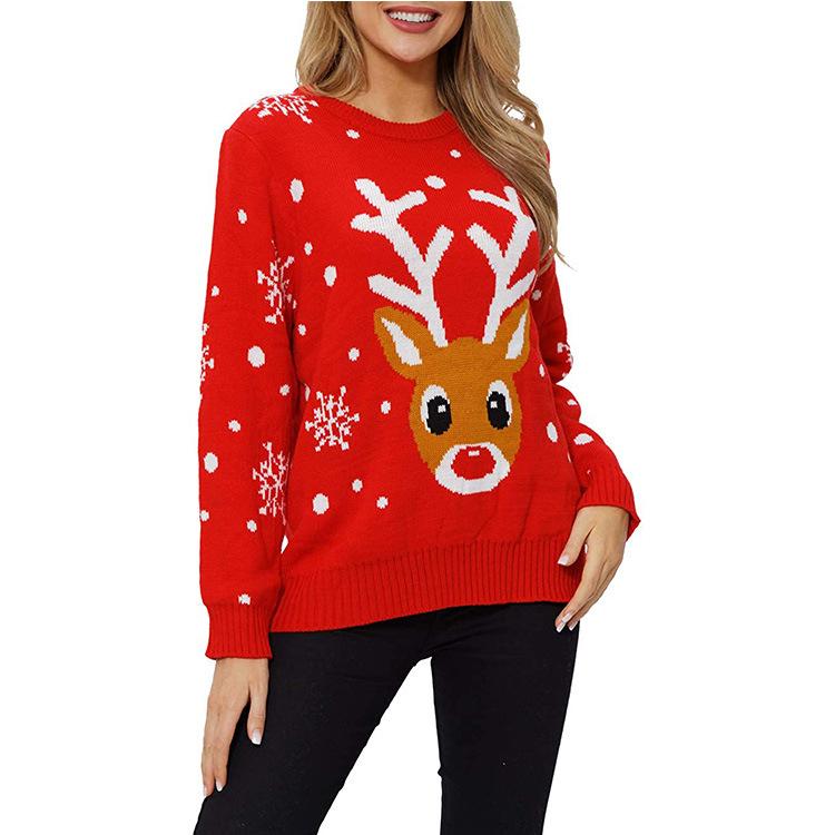 Women's red knitted Christmas jumper with a reindeer face and snowflake sleeves