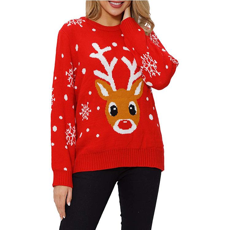 Women's red knitted Christmas jumper with a reindeer face and snowflake sleeves