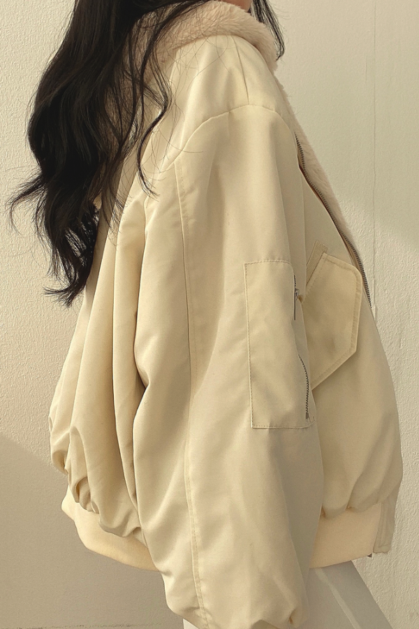 Women's reversible oversized bomber jacket with faux fur and a hood