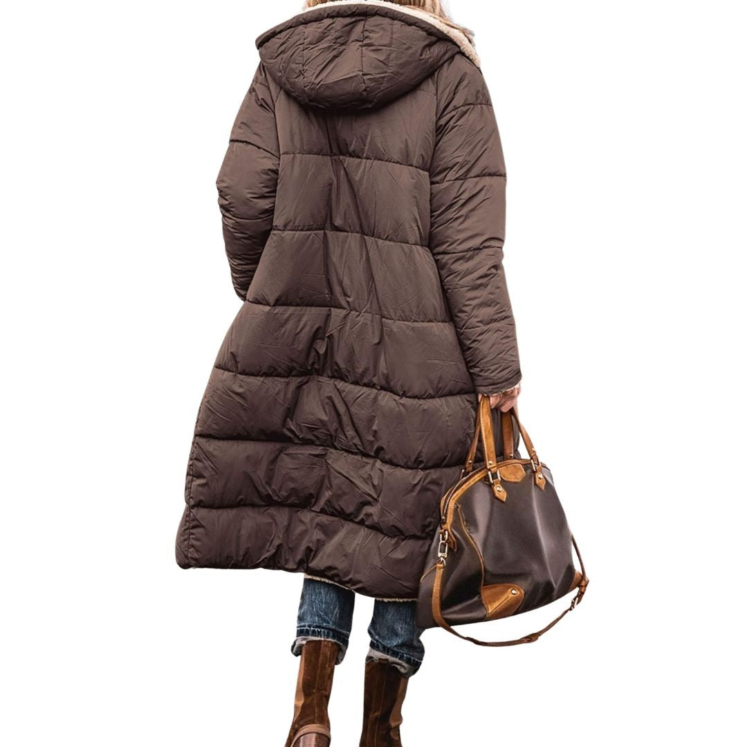 Women's reversible long puffer coat with a teddy lining and hood
