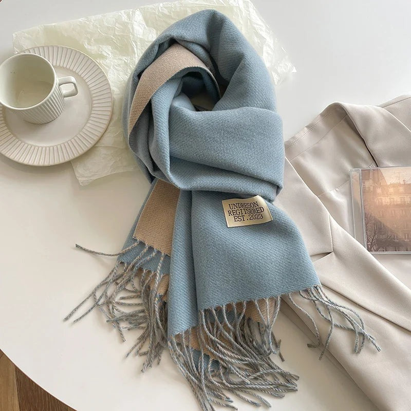 Women's reversible two-tone scarf with fringe and a small fabric label - light blue