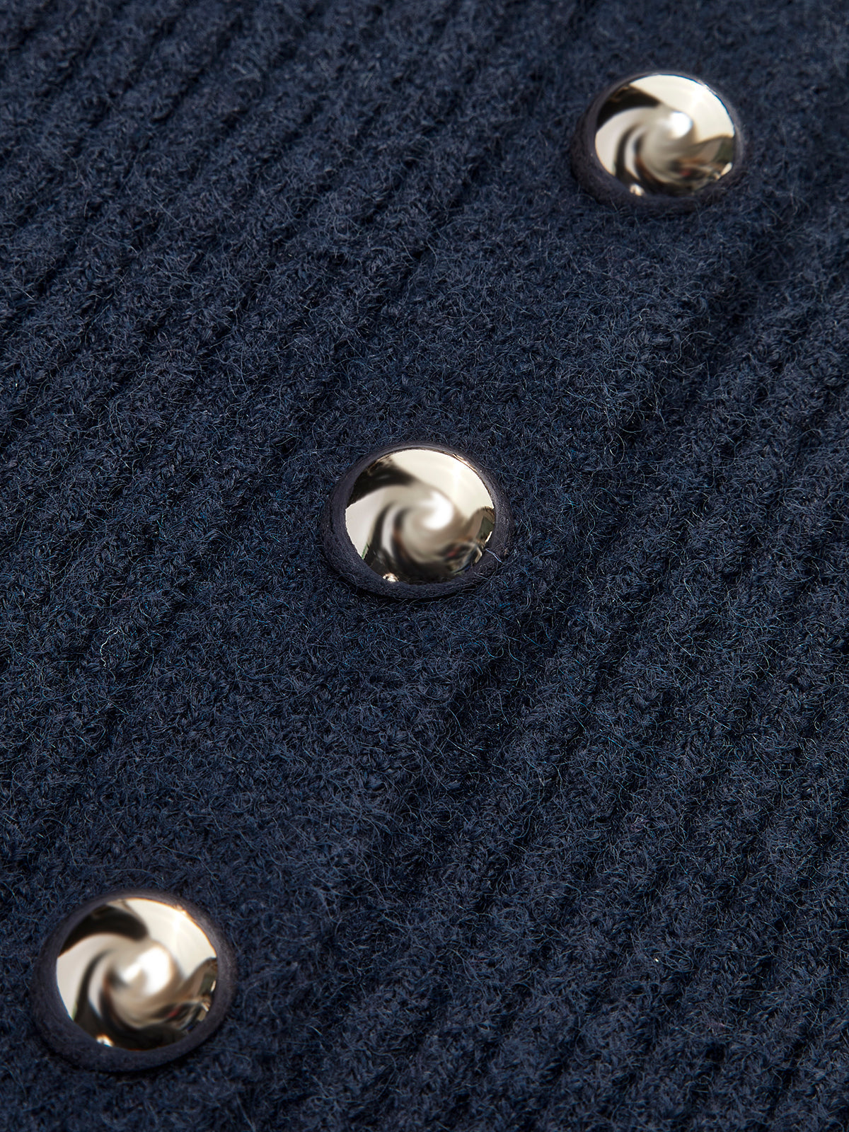 Women's ribbed crew neck cardigan with metal buttons and a scalloped hem