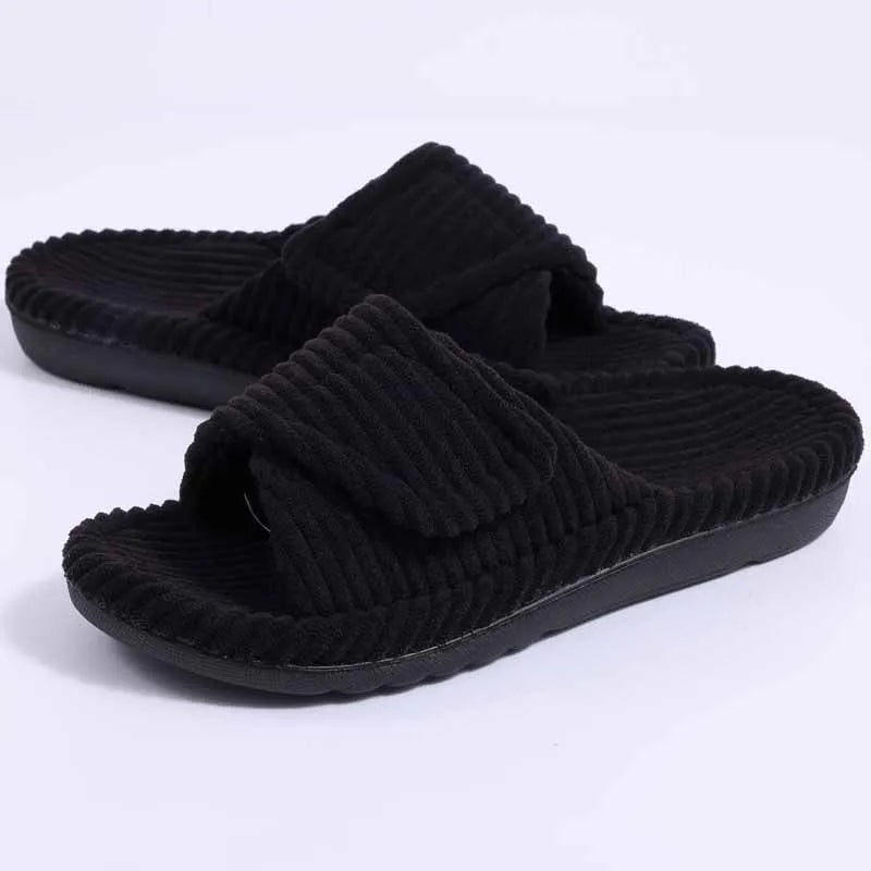 Open toe slippers in ribbed fabric with an adjustable hook-and-loop strap - black