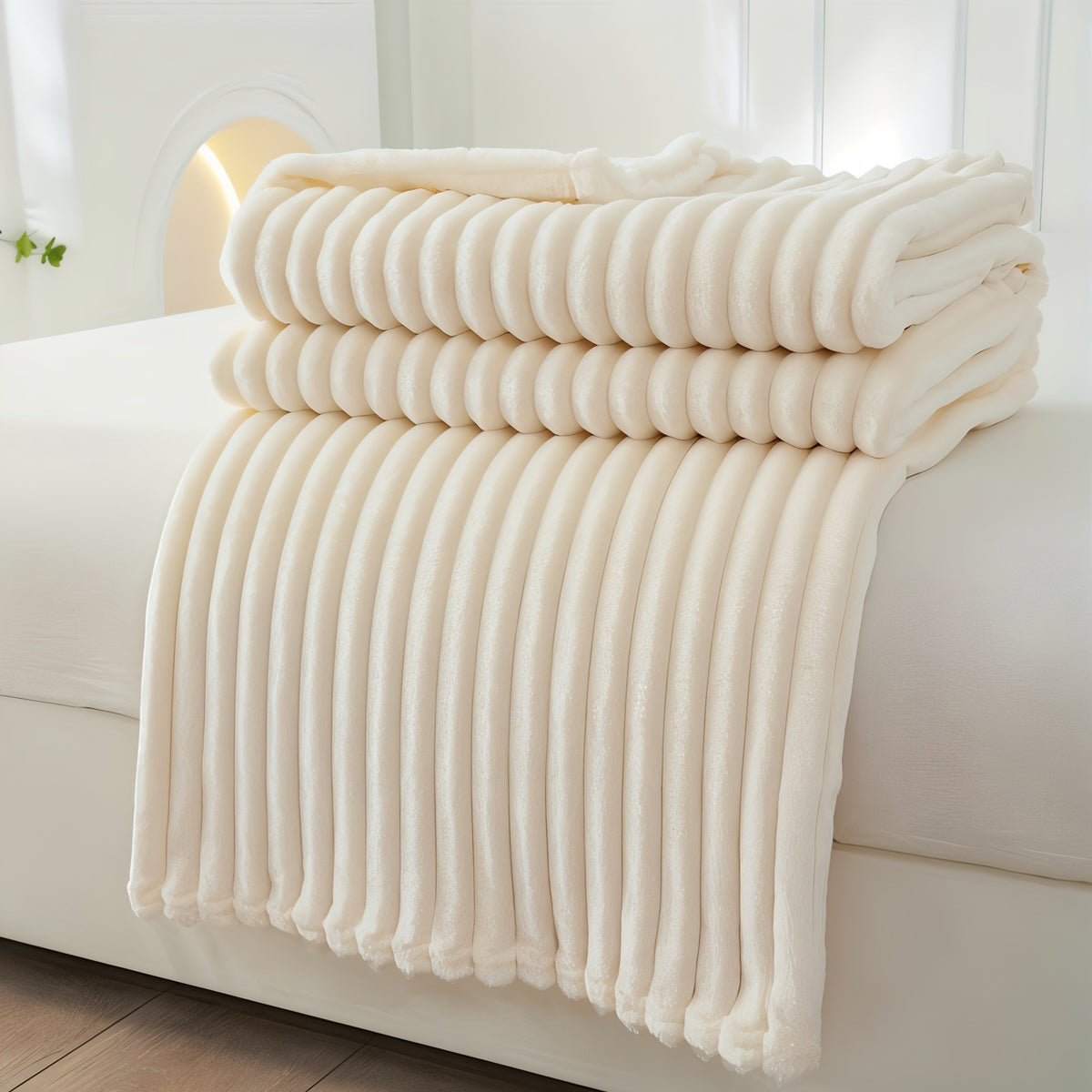 Fleece throw with a ribbed texture in soft plush - cream