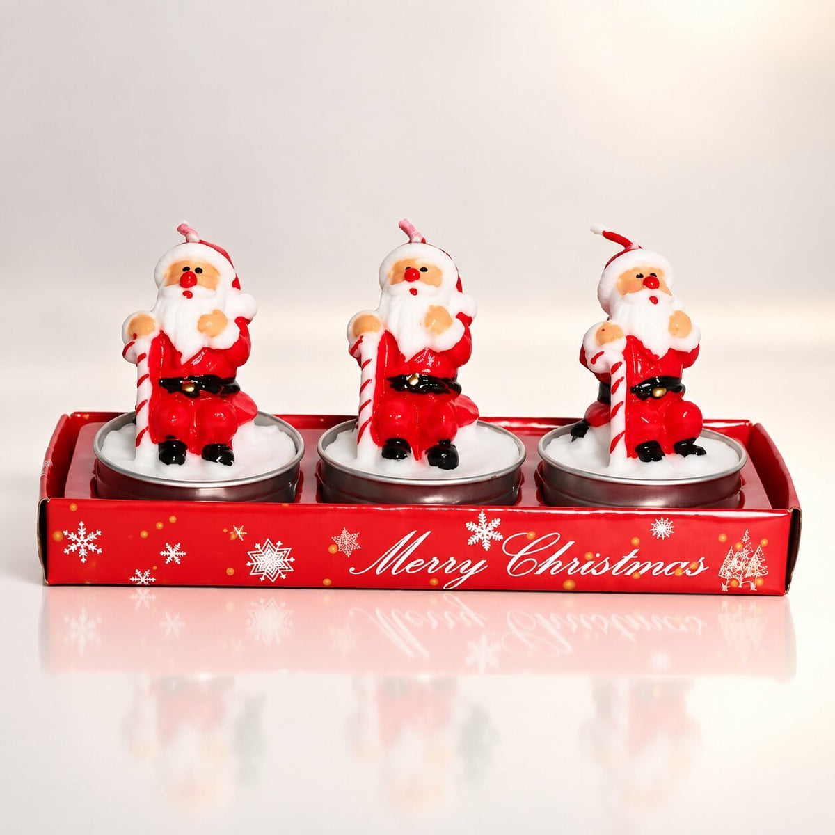 Three Santa Christmas tea lights in a red tray - santa with candy cane