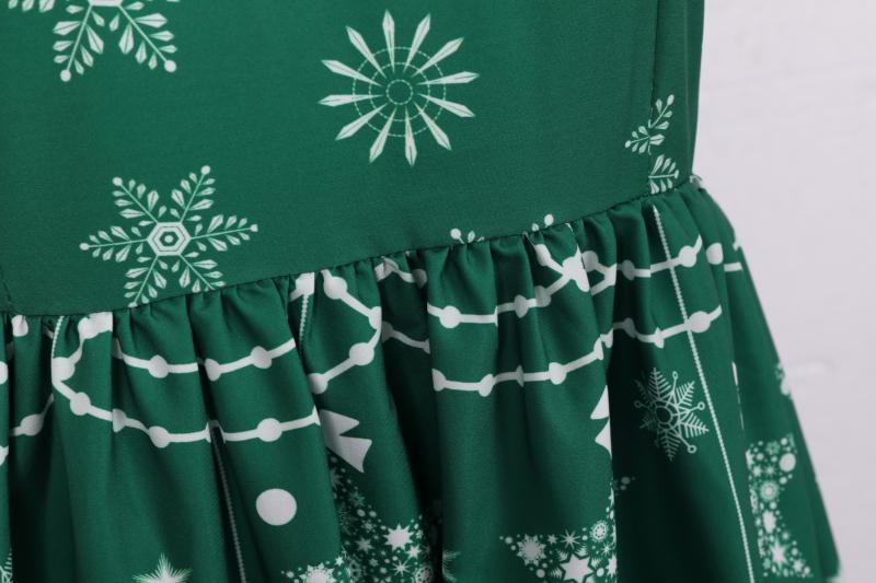 Women's sleeveless Christmas dress with black lace yoke and reindeer print