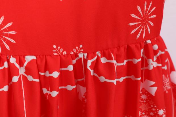 Women's sleeveless Christmas dress with black lace yoke and reindeer print
