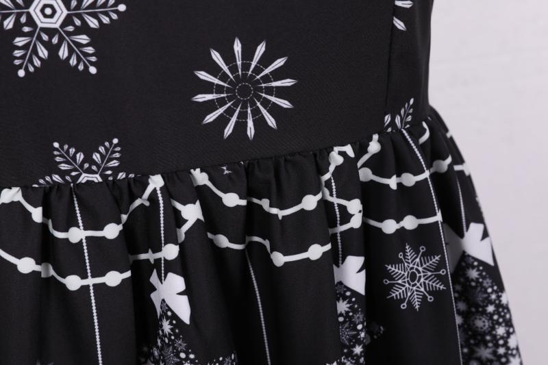 Women's sleeveless Christmas dress with black lace yoke and reindeer print