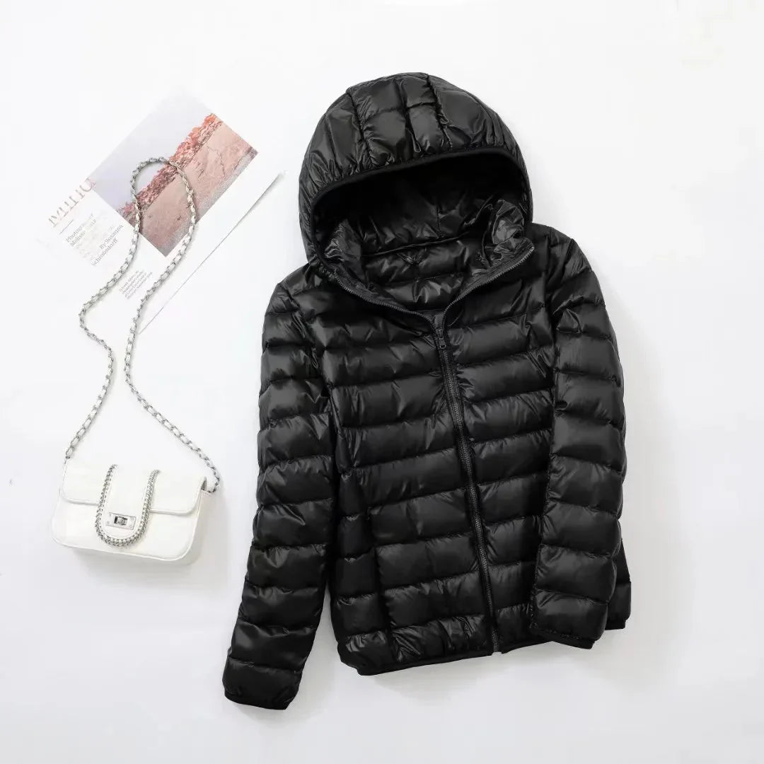 Women's slim lightweight puffer jacket with narrow quilting and a hood - black